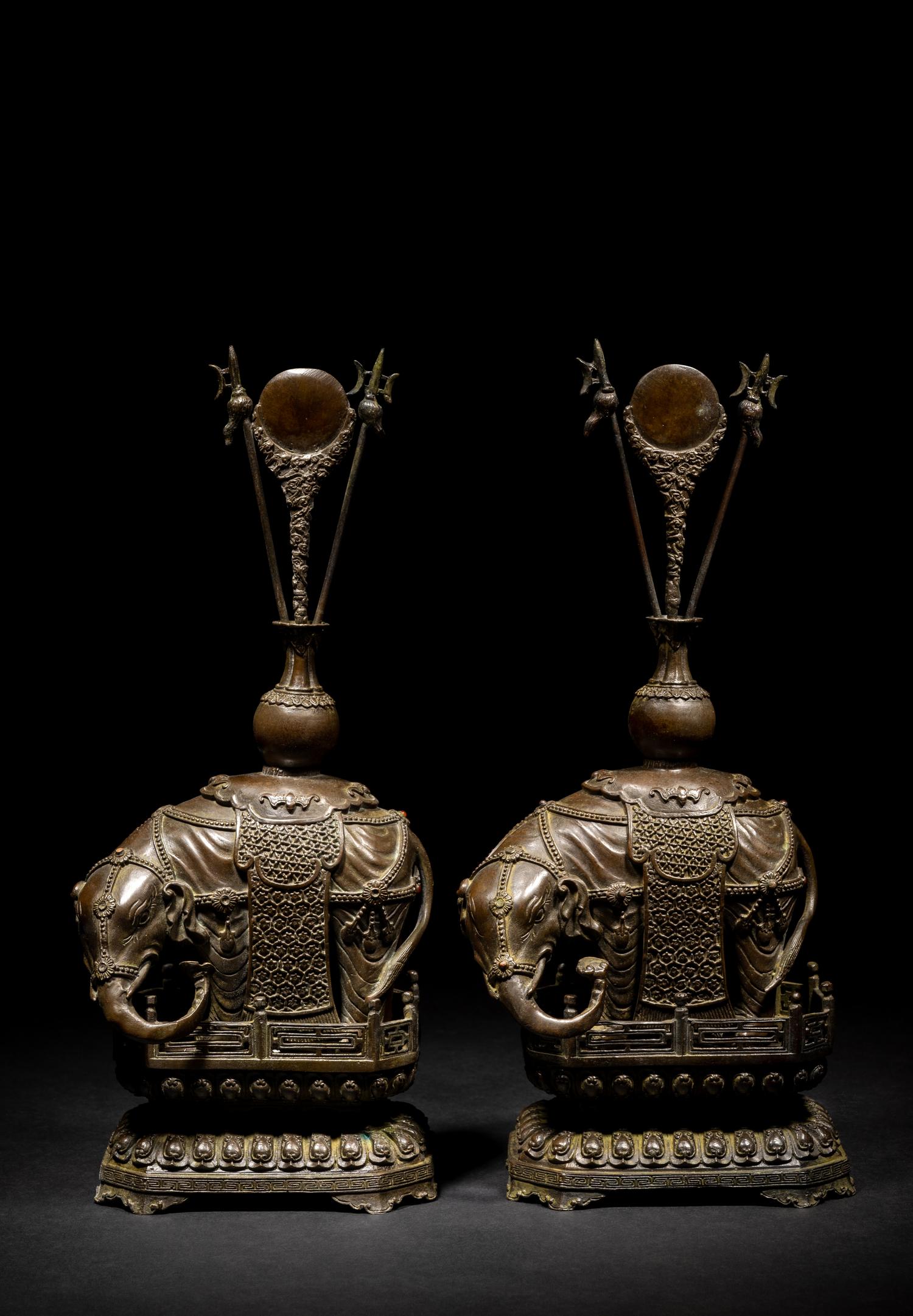 A Pair of Chinese Bronze Figures of Elephants