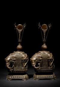 A Pair of Chinese Bronze Figures of Elephants