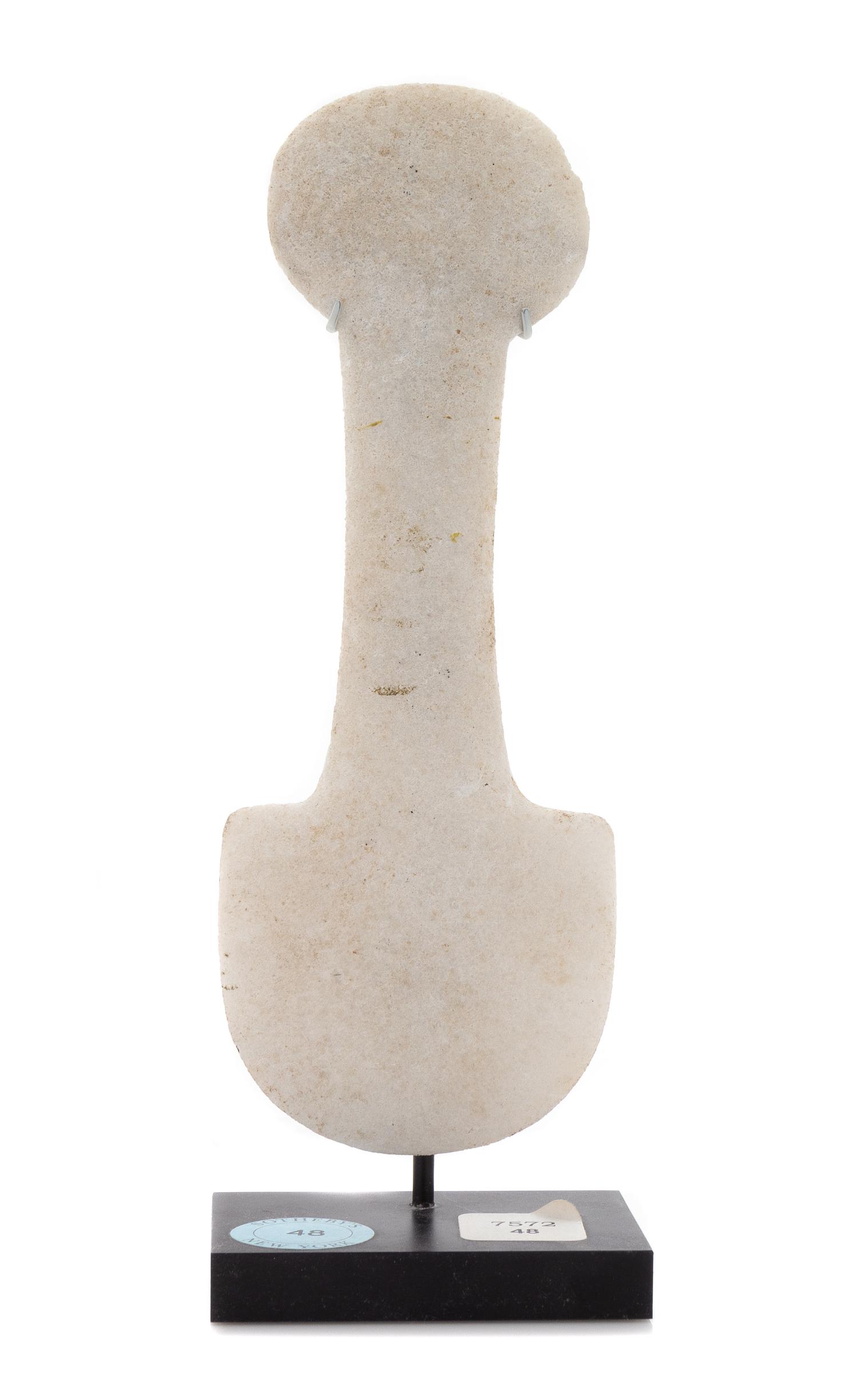 An Anatolian Marble Kusura Type Idol Height 7 5/8 inches. — EARLY BRONZE AGE II, CIRCA 2700-2400 B.C.E.