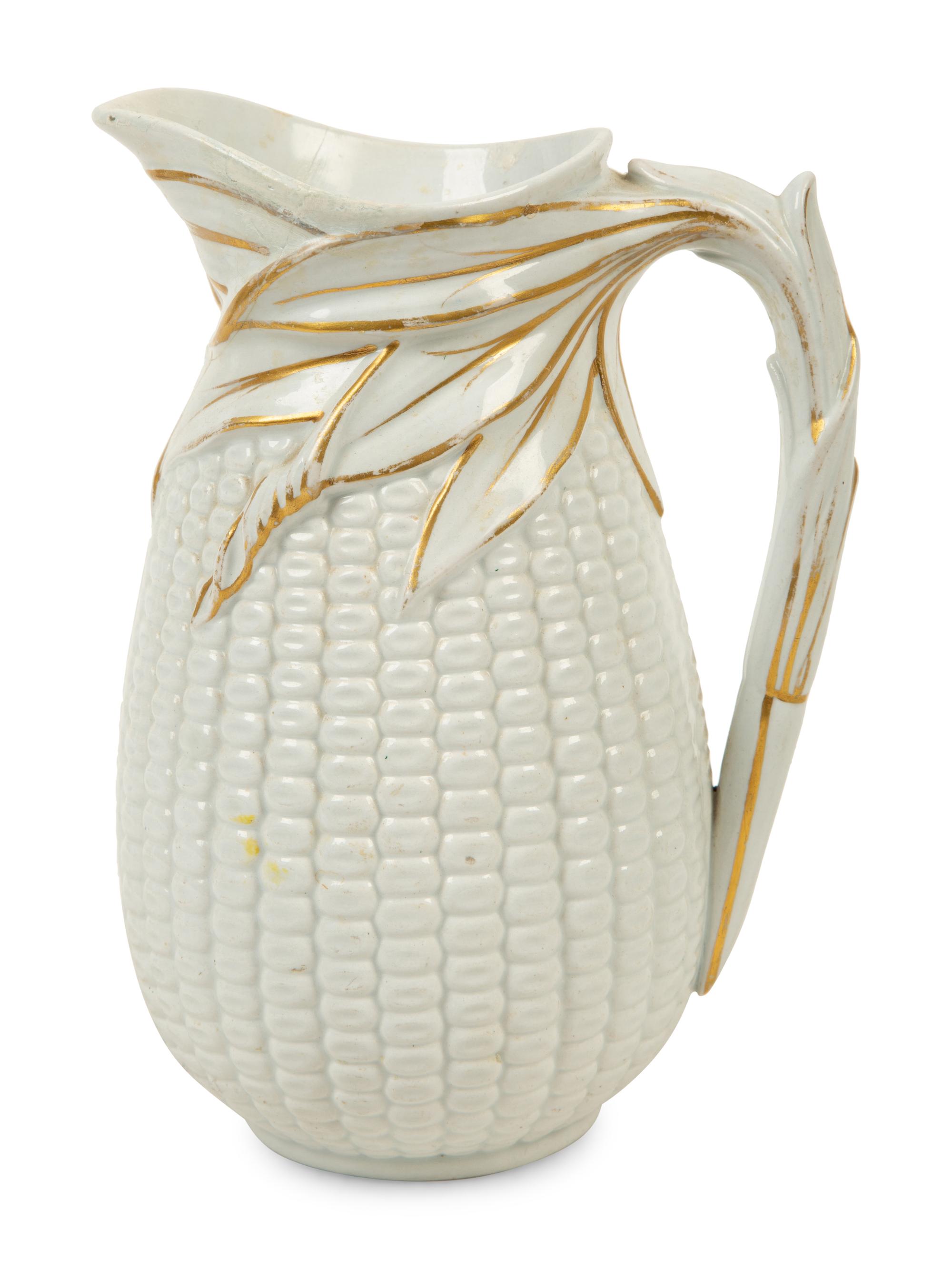 A Collection of Eight English Salt Glazed Relief Form Pitchers and Molded Earthenware — 19TH CENTURY