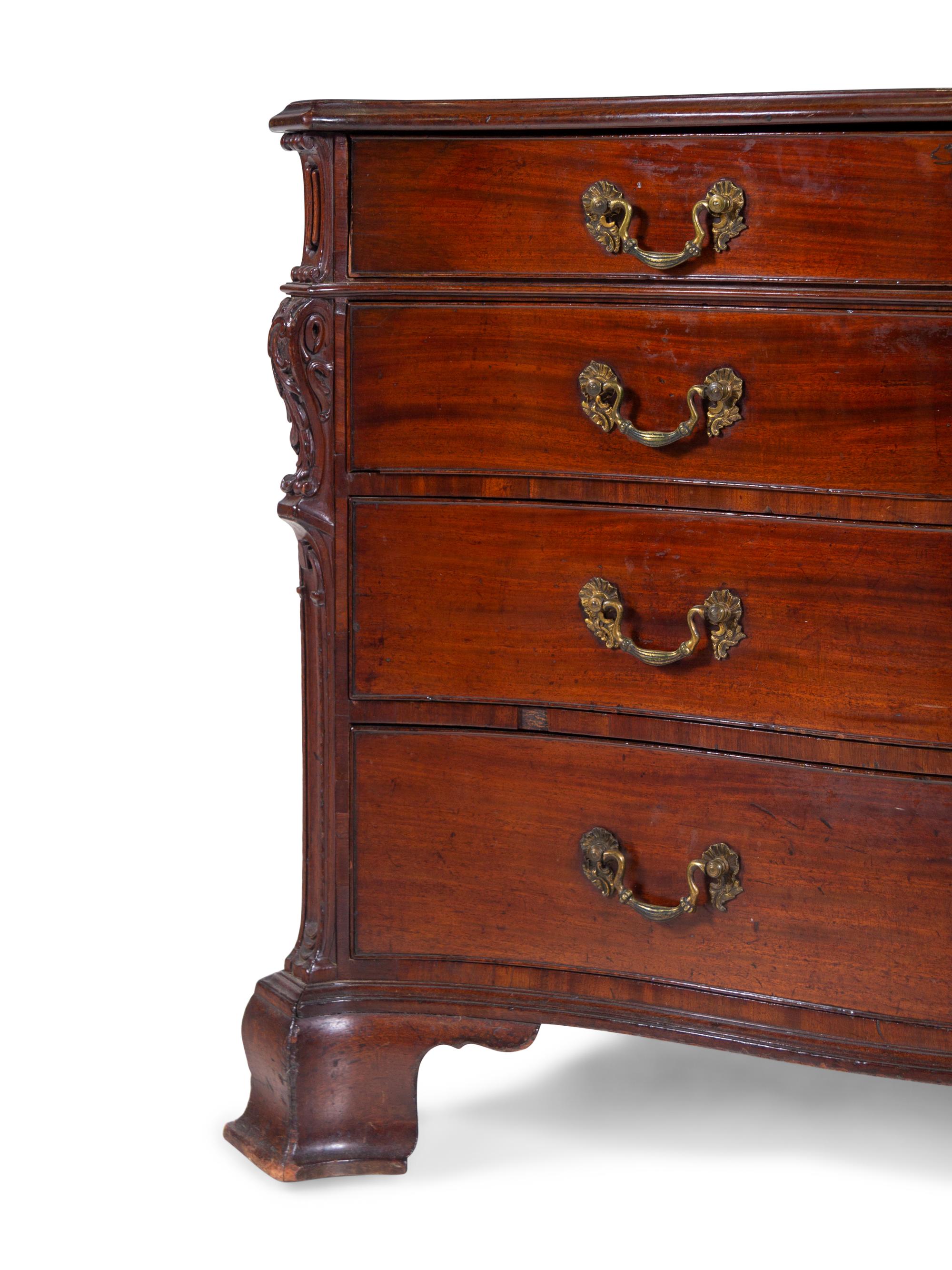 A George III Carved Mahogany Chest of Drawers