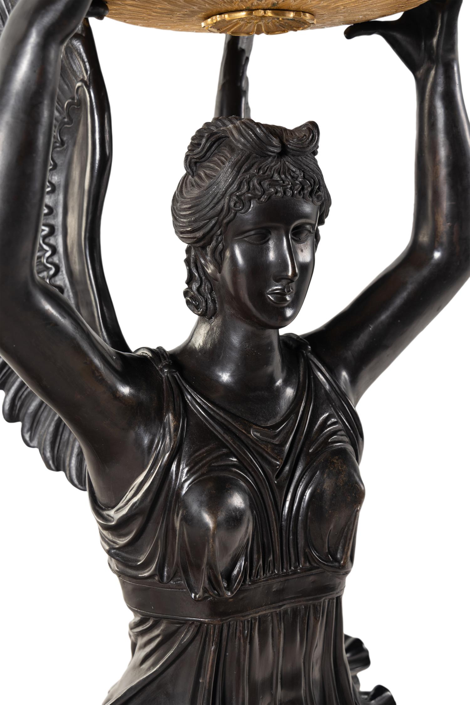 A Monumental Empire Style Gilt and Patinated Bronze Figural Torchère