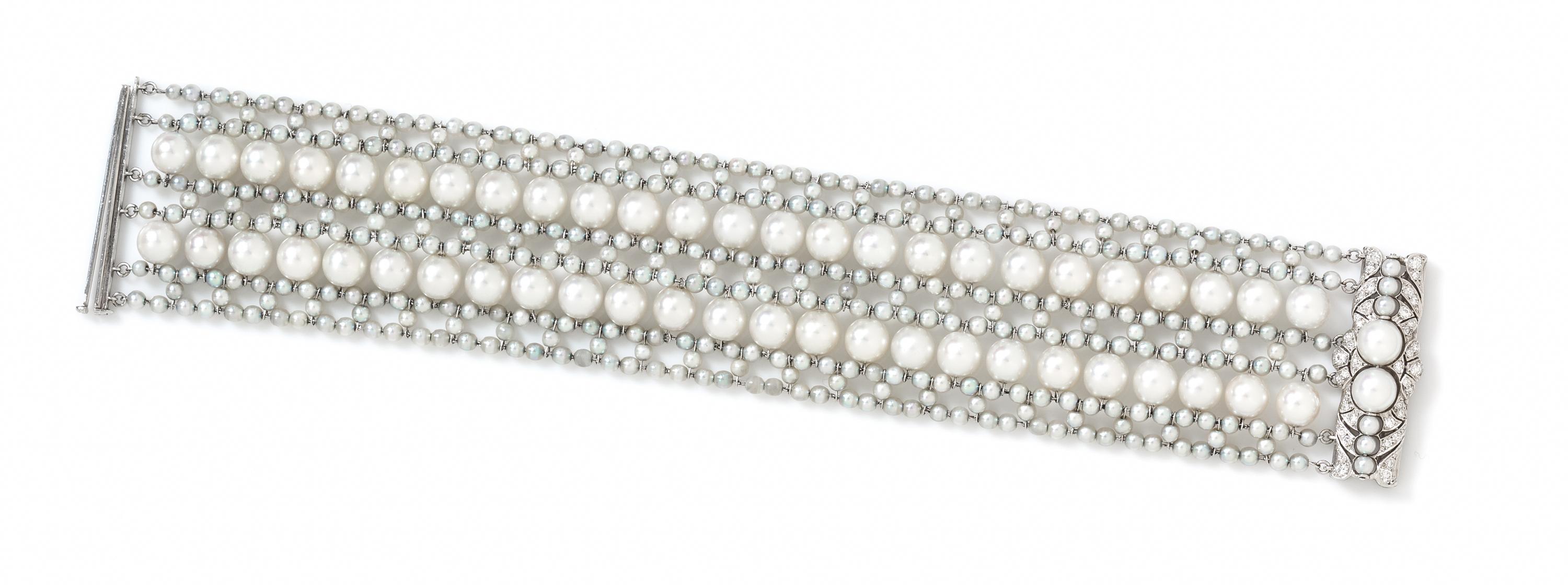 A Platinum, Diamond and Cultured Pearl Bracelet, 43.30 dwts.