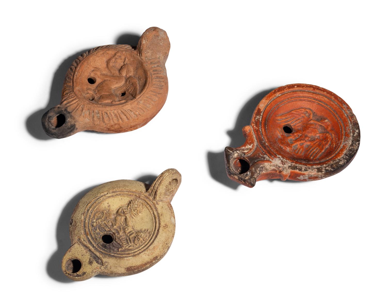 Three Roman Terracotta Oil Lamps