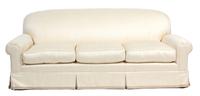A Contemporary Upholstered Three-Cushion Sofa Height 37 x length 87 inches. — 20TH CENTURY