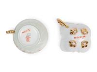 Two Continental Porcelain Moustache Cups and Saucers