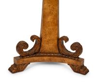 A Baker Regency Style Mahogany, Walnut and Elmwood Center Table
