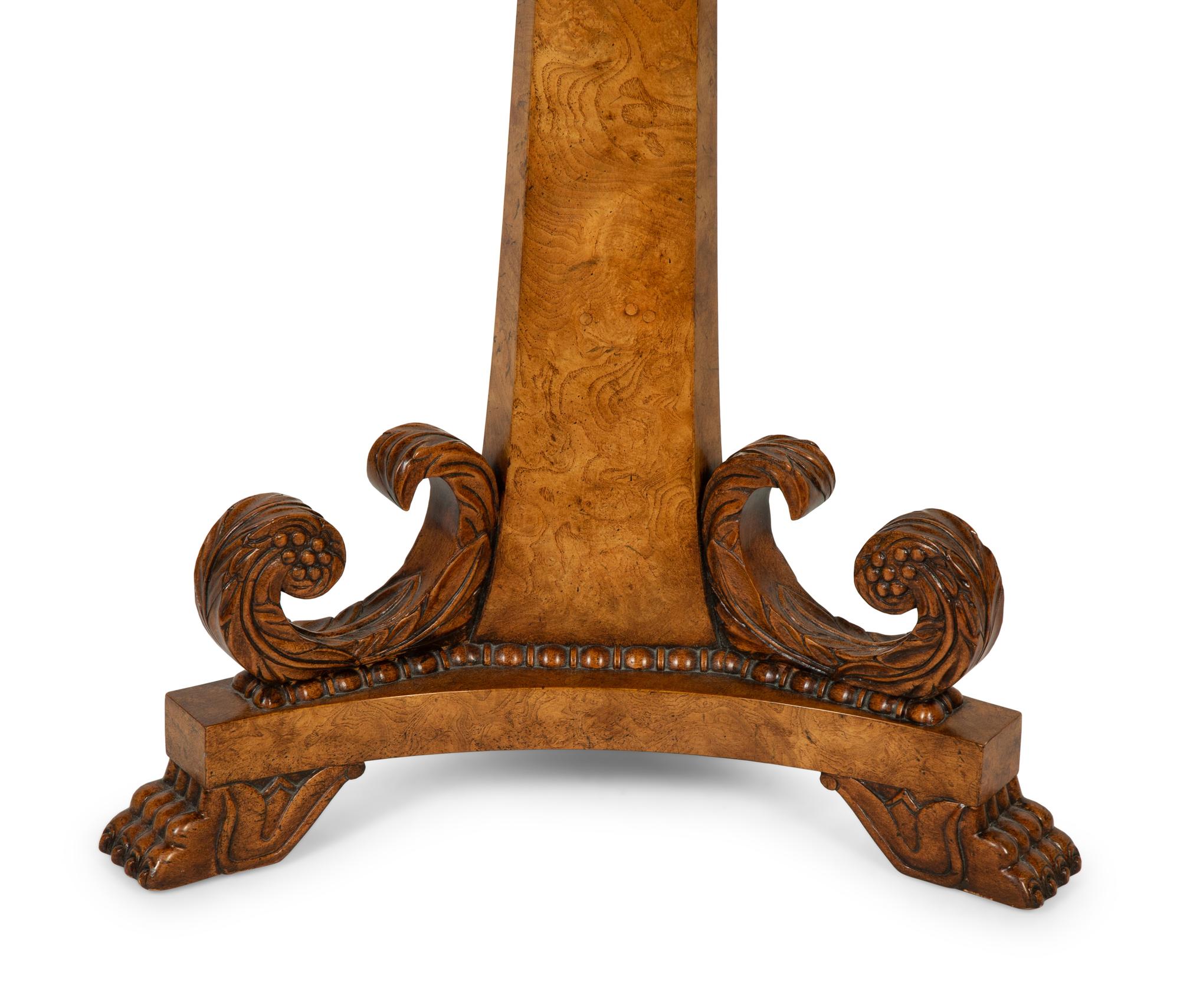 A Baker Regency Style Mahogany, Walnut and Elmwood Center Table