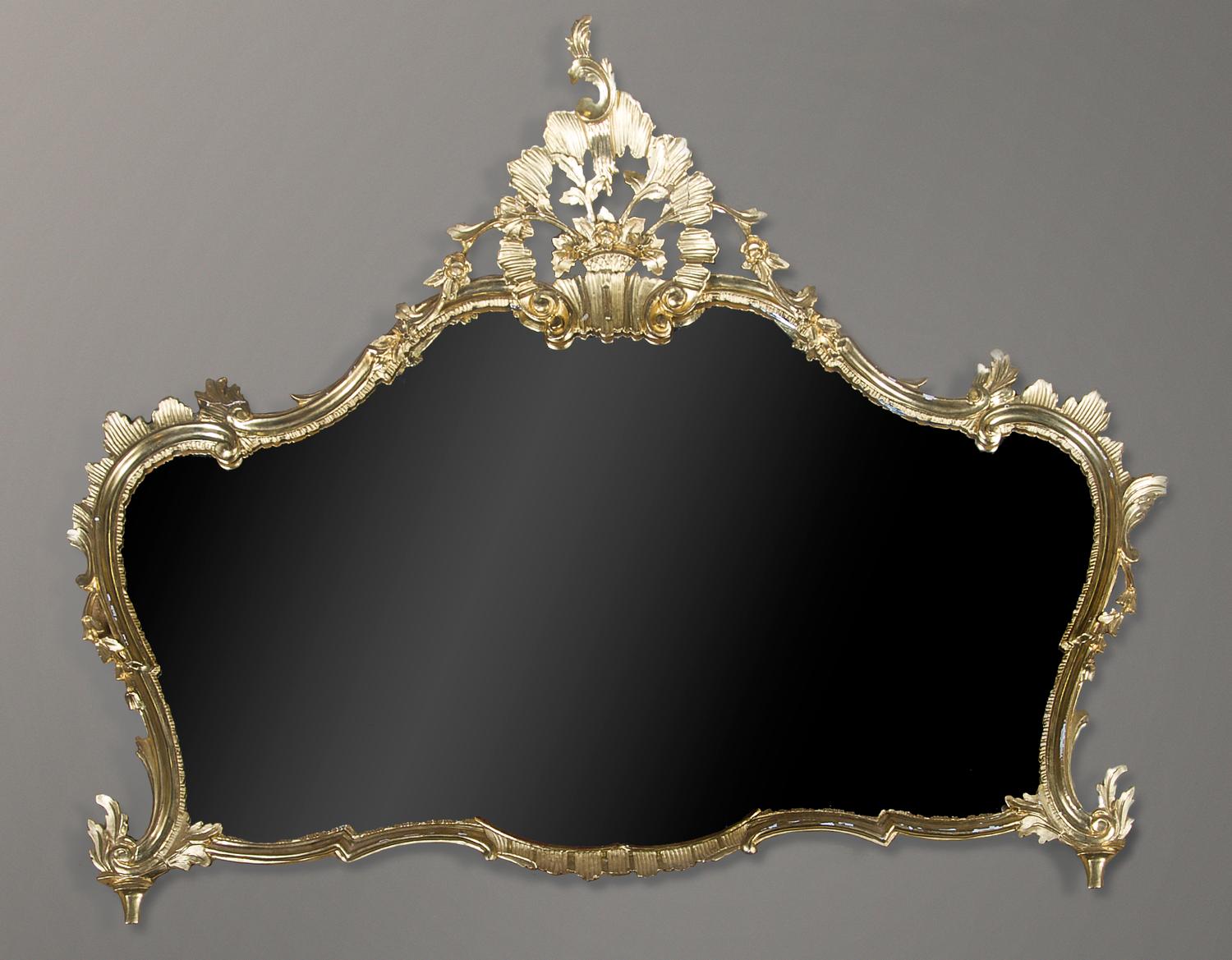 A Louis XV Style Giltwood Over Mantle Mirror, Height 45 x width 51 inches.