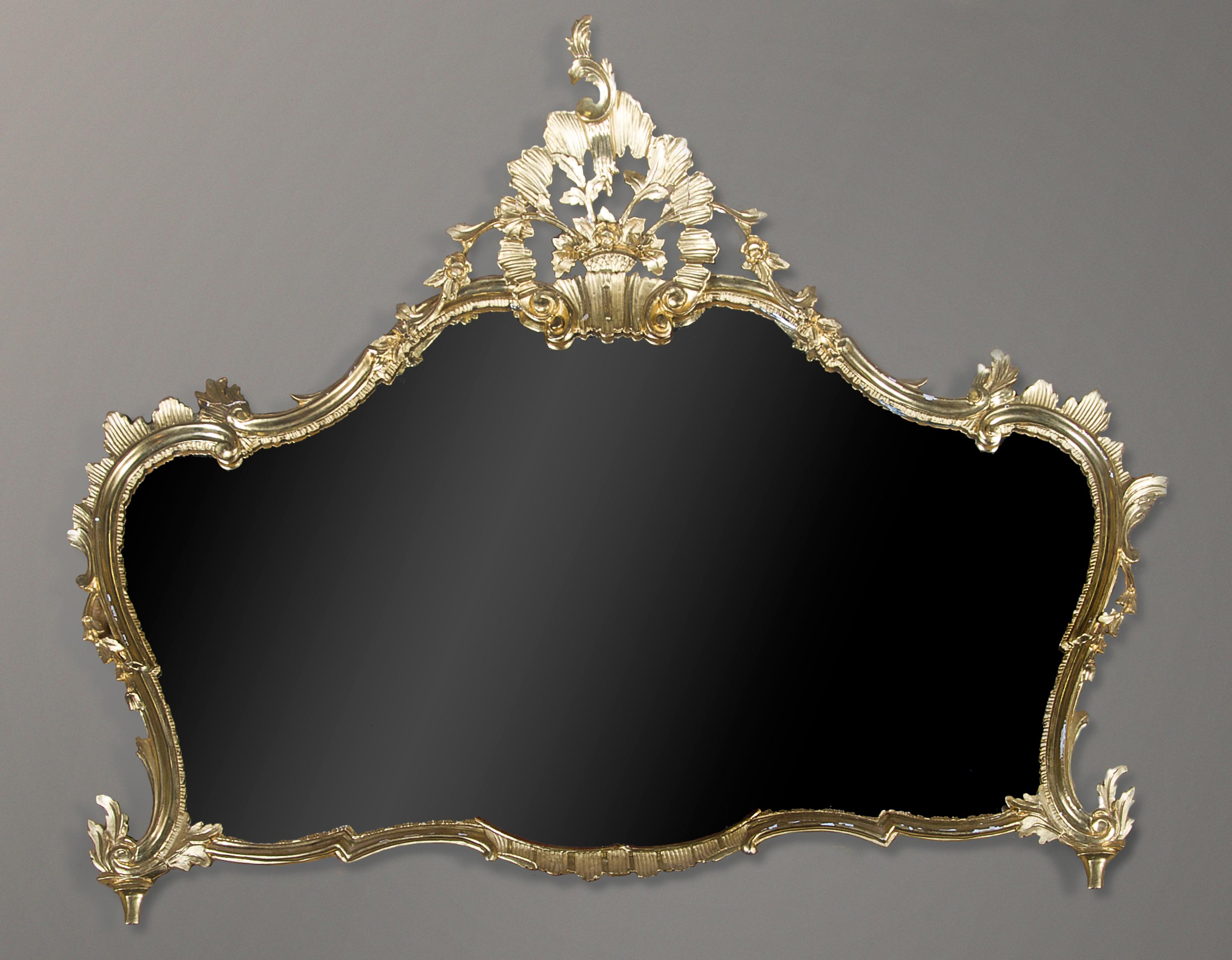 A Louis XV Style Giltwood Over Mantle Mirror, Height 45 x width 51 inches.