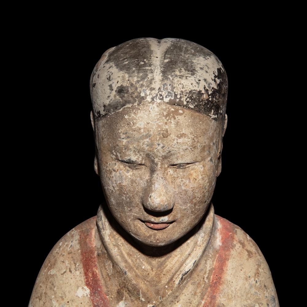 A Chinese Painted Pottery Dancing Lady with Long Sleeves