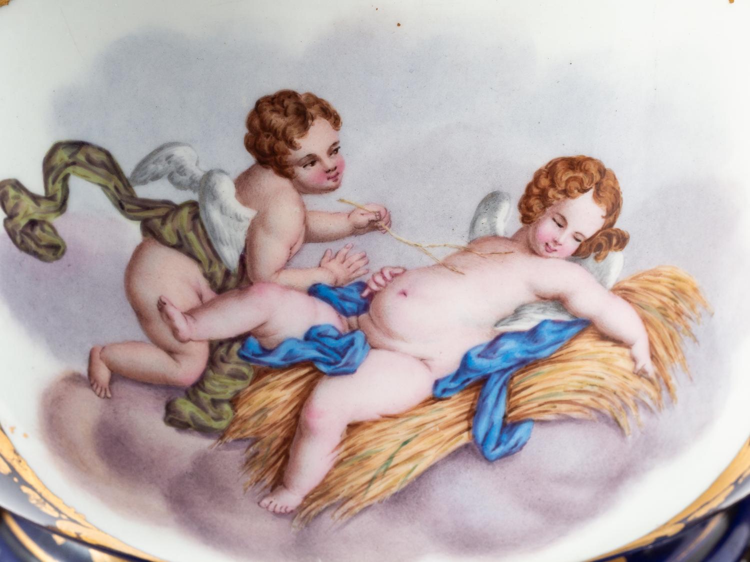 A Pair of Gilt Bronze Mounted Sèvres Style Porcelain Cache Pots