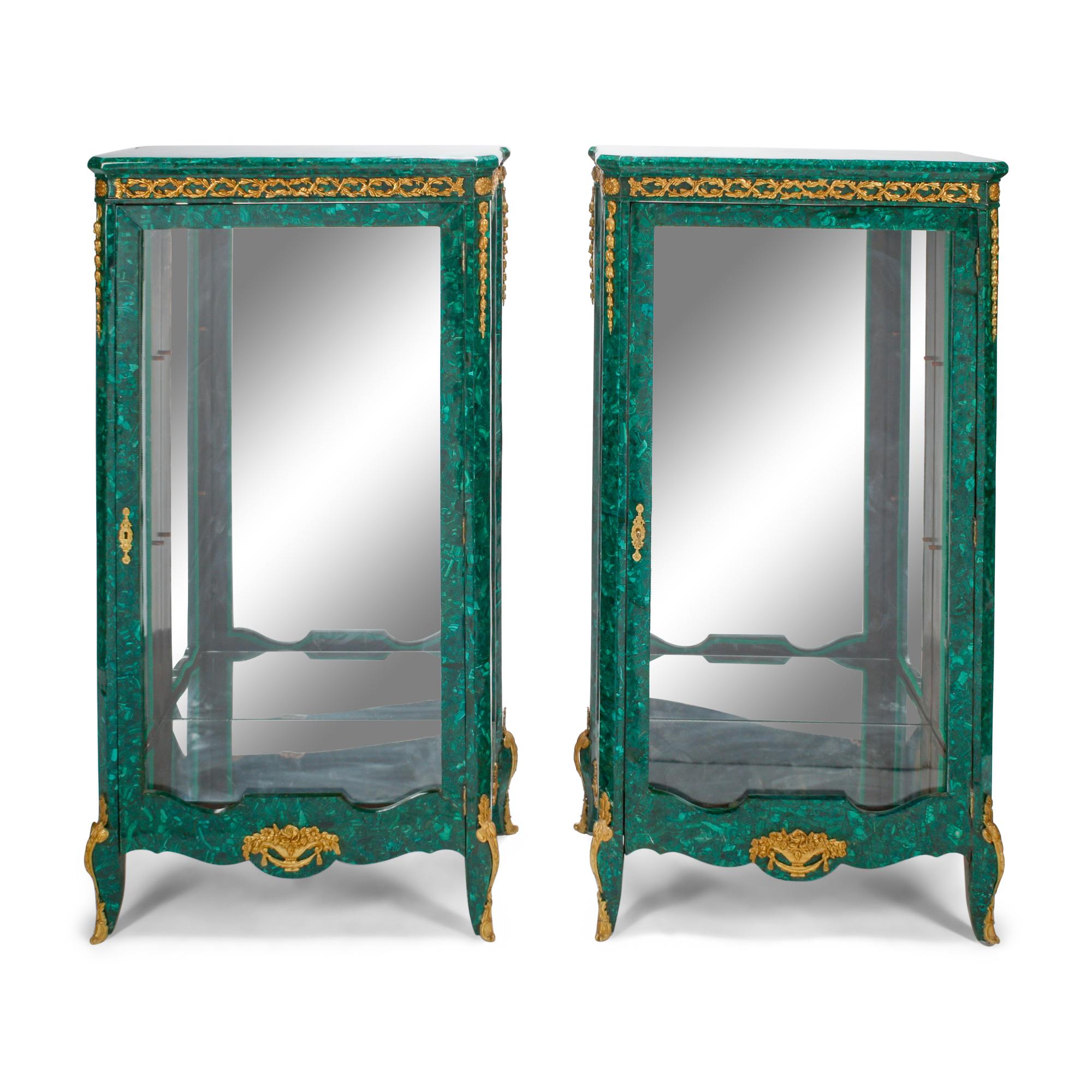 A Pair of Louis XVI Style Malachite Veneered and Gilt Bronze Mounted Vitrine Cabinets