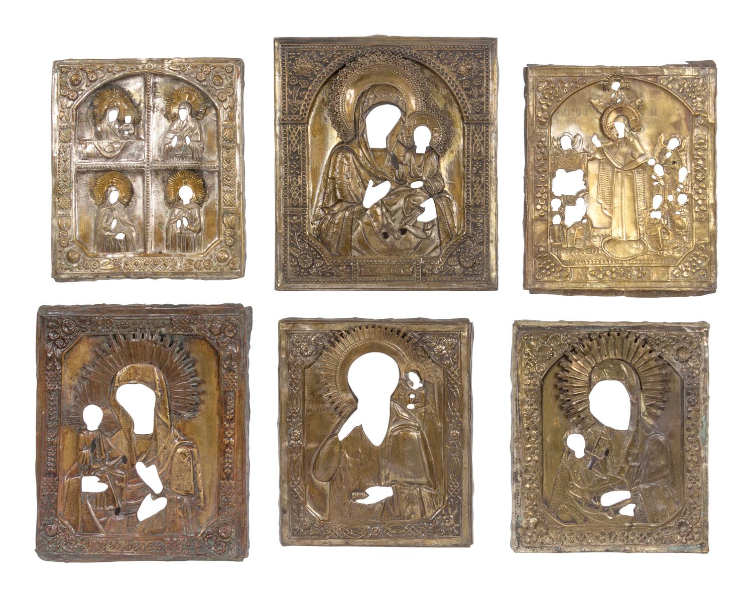 Eleven Russian Pierced and Repoussé Decorated Brass Rizas