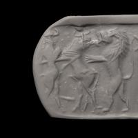 An Akkadian Hematite Cylinder Seal