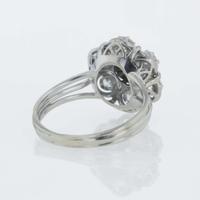 A 14K white gold and diamond ring