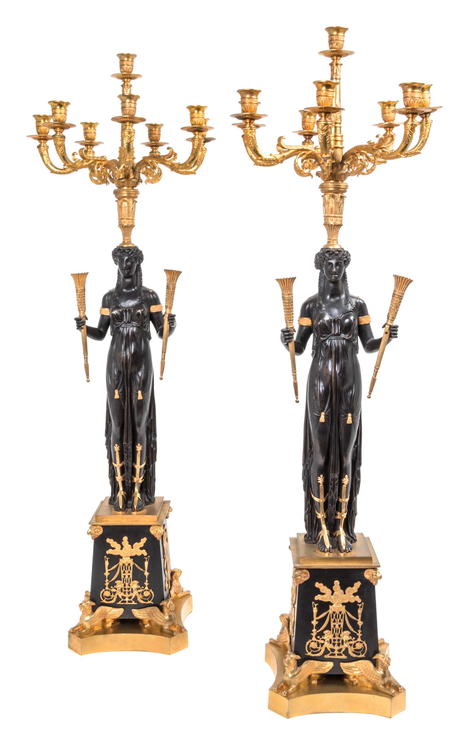 A Pair of Empire Style Gilt and Patinated Bronze Eight-Light Candelabra — MANNER OF PIERRE-PHILIPPE THOMIRE, 19TH CENTURY