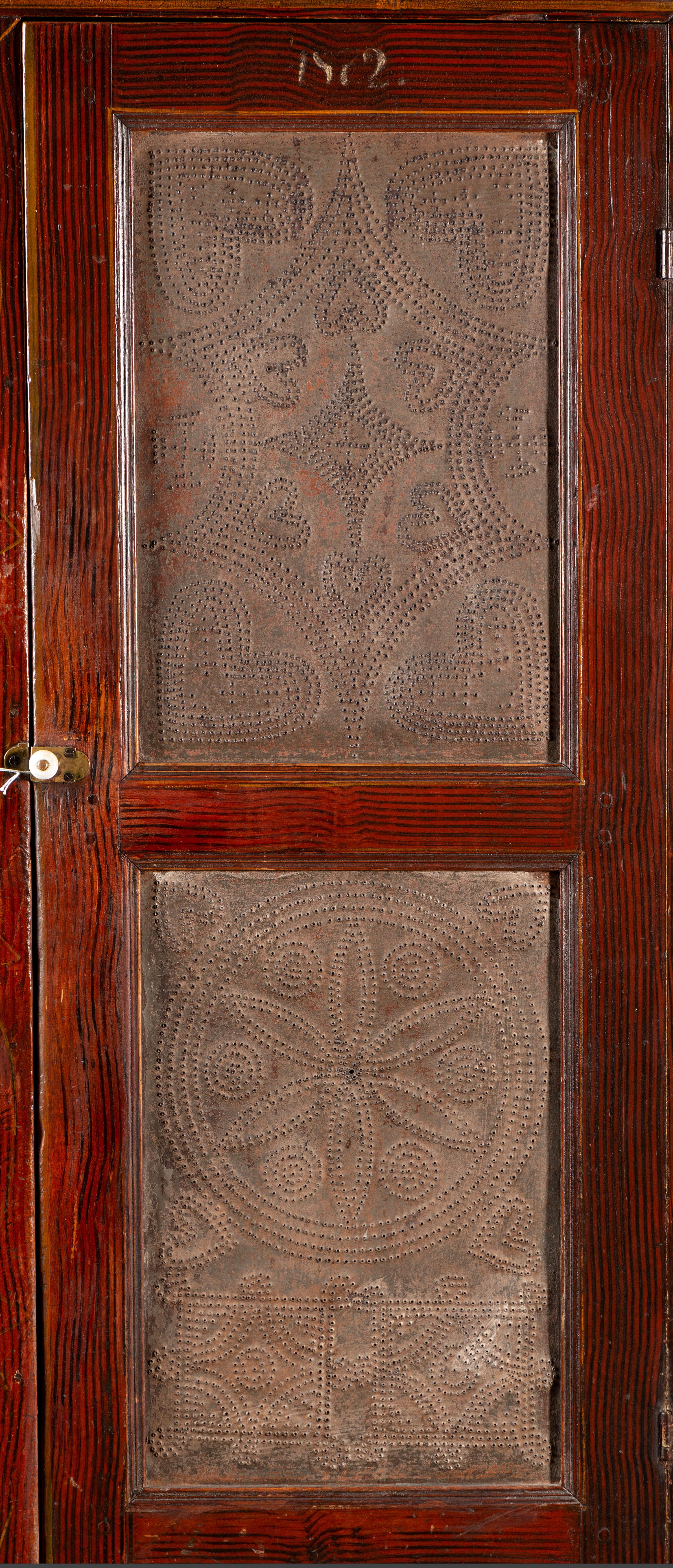 A Country Grain Painted Pine and Pressed Sheet Tin Pie Safe and Marriage Cabinet
