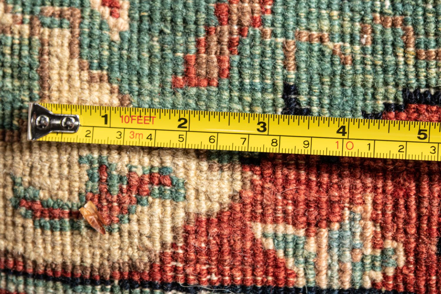 A Heriz Wool Rug
