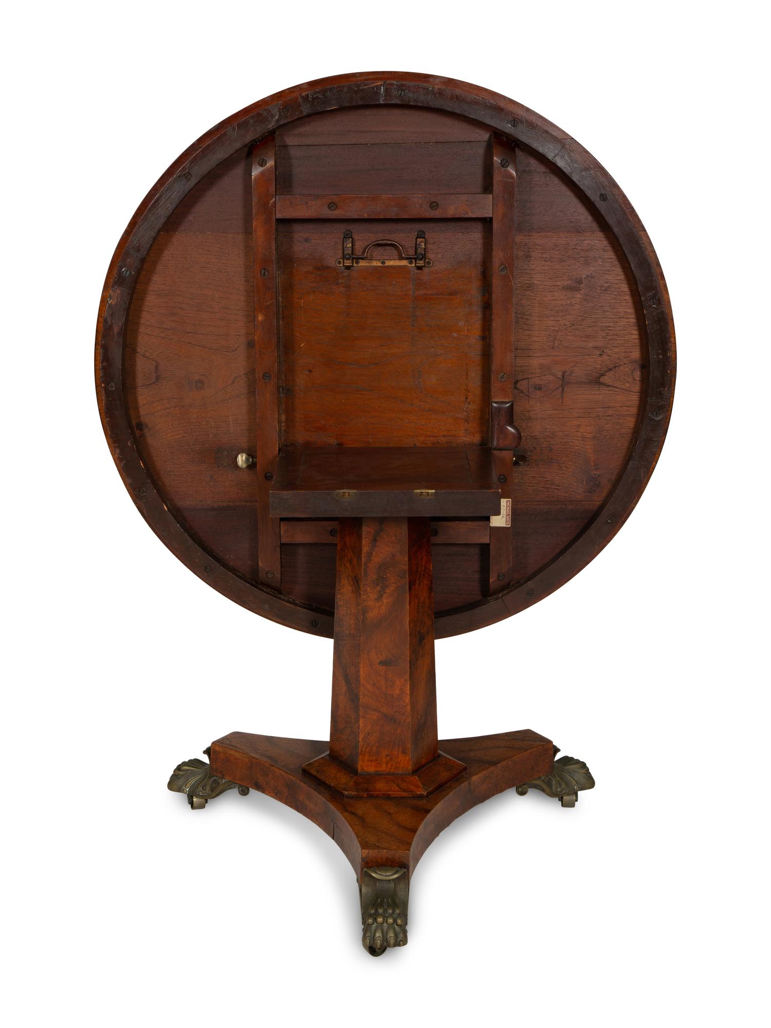 A Regency Gilt Bronze Mounted Burl Yew-Wood Veneered Tilt-Top Table