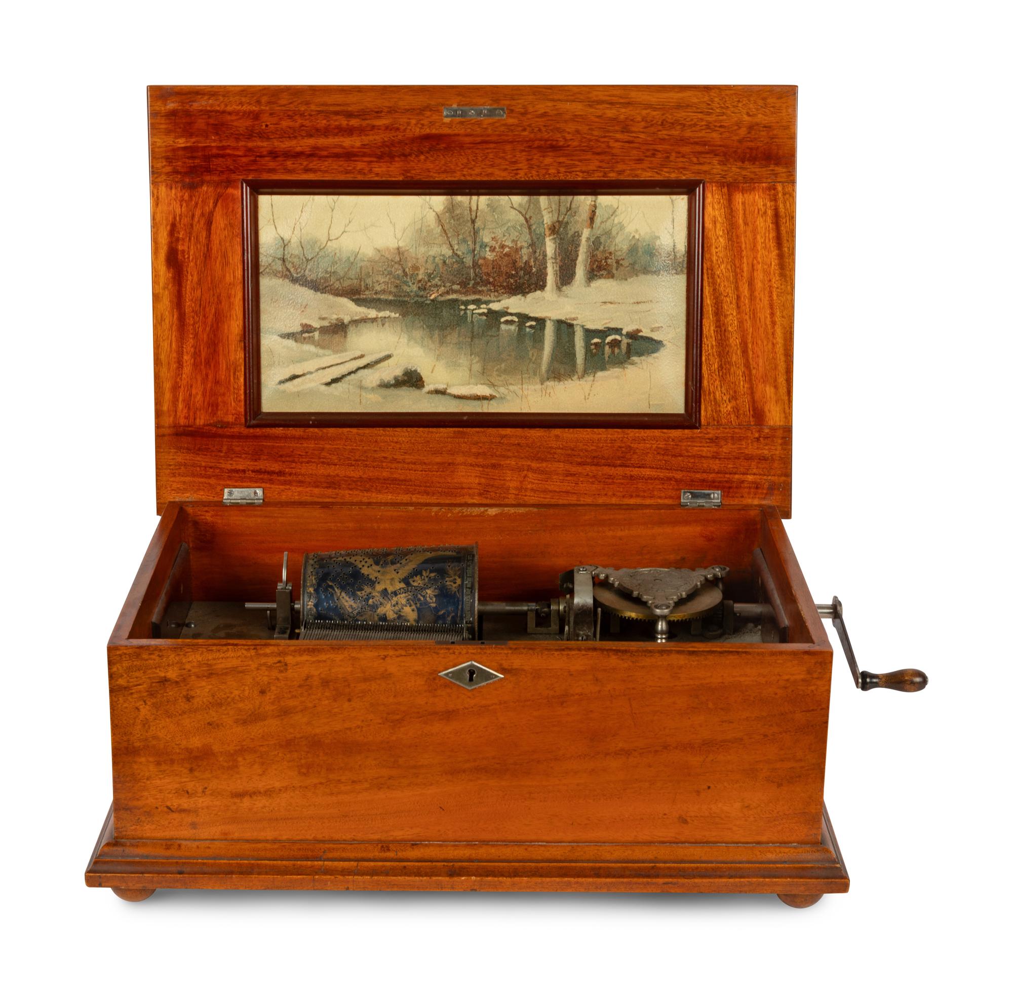 A Capital Cuff Model C Music Box