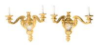 A Pair of Neoclassical Gilt Bronze Two-Light Sconces, Height overall 21 inches.