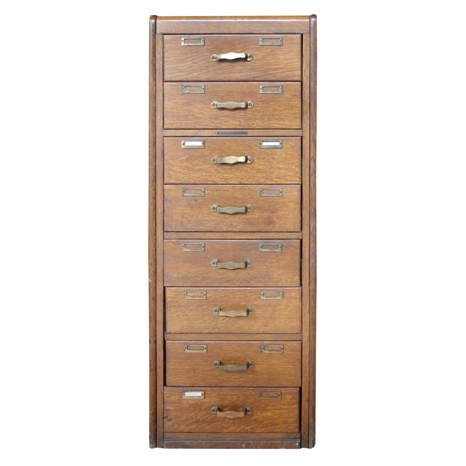 An Oak Eight Drawer Filing Cabinet 18" W x 27" D x 51.5" H — United States, Circa 1910
