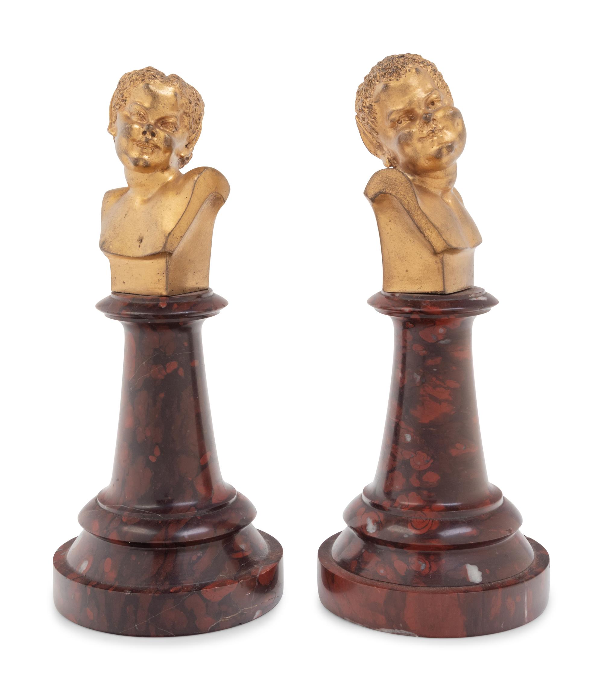 A Pair of French Gilt Bronze and Marble Busts