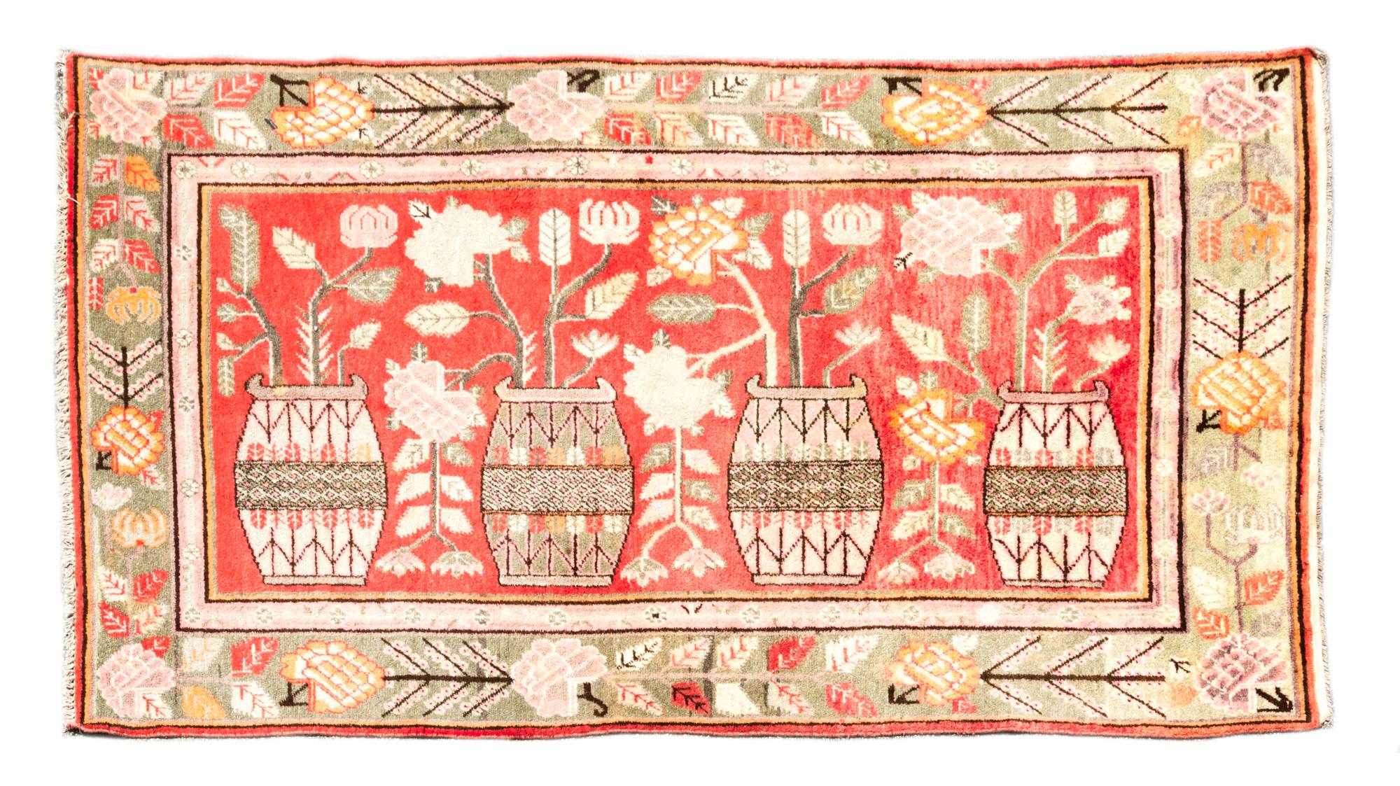 A Persian Wool Rug 8 feet 10 1/2 inches x 5 feet.