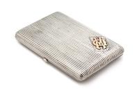 A Russian Silver and 10-Karat Rose Gold Mounted Cigarette Case, Mark of Ivan Krutikov, Moscow, 19th Century, the reeded case with an ap