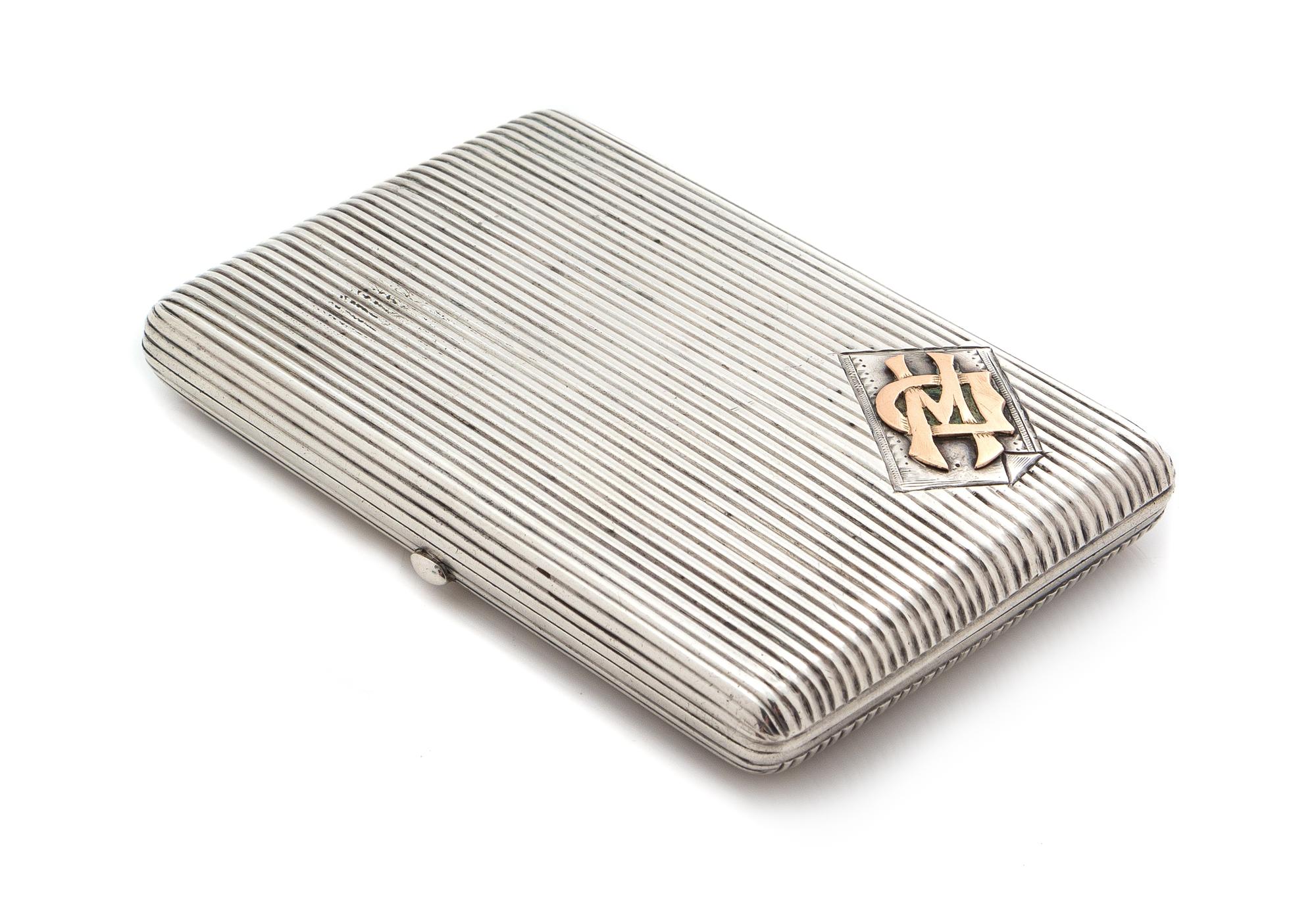 A Russian Silver and 10-Karat Rose Gold Mounted Cigarette Case, Mark of Ivan Krutikov, Moscow, 19th Century, the reeded case with an ap