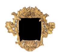 An Italian Baroque Giltwood Mirror, Height 51 1/2 x width 57 1/2 inches.