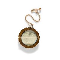 A Neoclassical Gold and Cameo Brooch with a Mourning Goddess