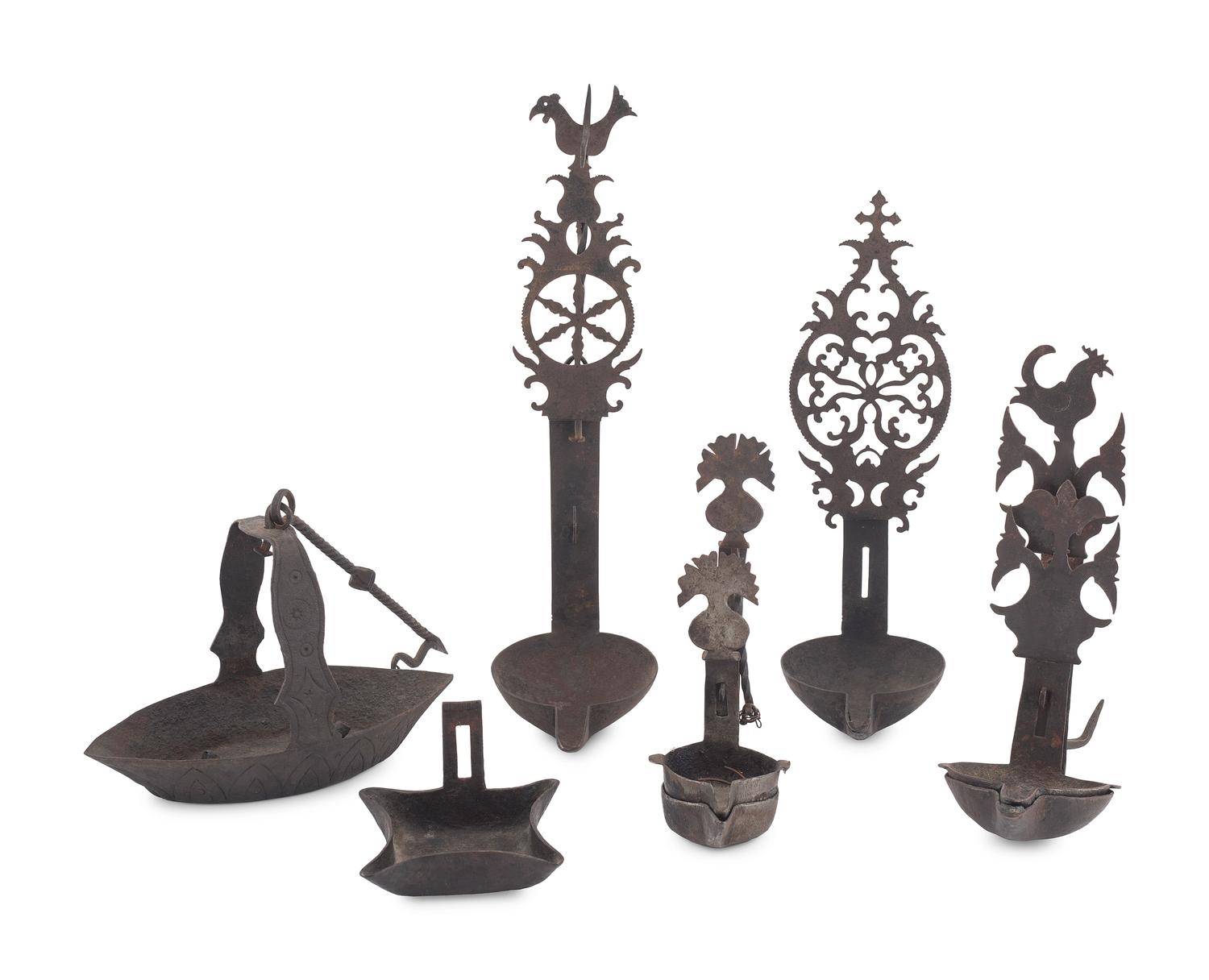 An Assortment of Iron Hearth and Lighting Articles