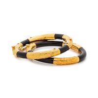 HIGH KARAT GOLD AND WOOD BANGLE SET