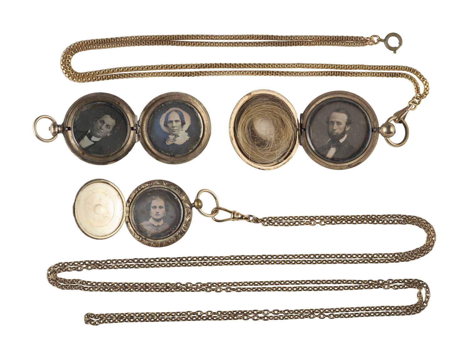 [EARLY PHOTOGRAPHY]. 11 lockets containing daguerreotypes and tintypes.