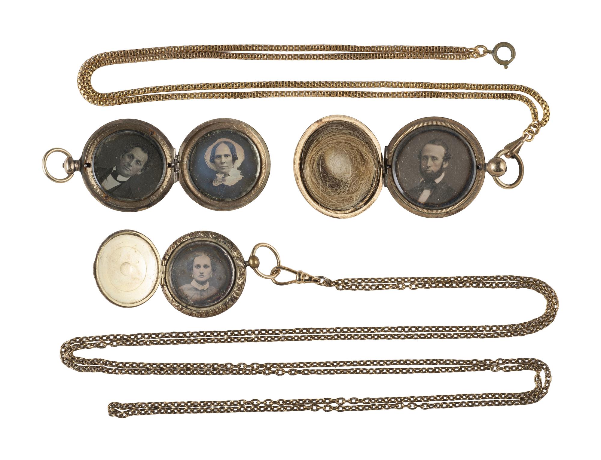 [EARLY PHOTOGRAPHY]. 11 lockets containing daguerreotypes and tintypes.