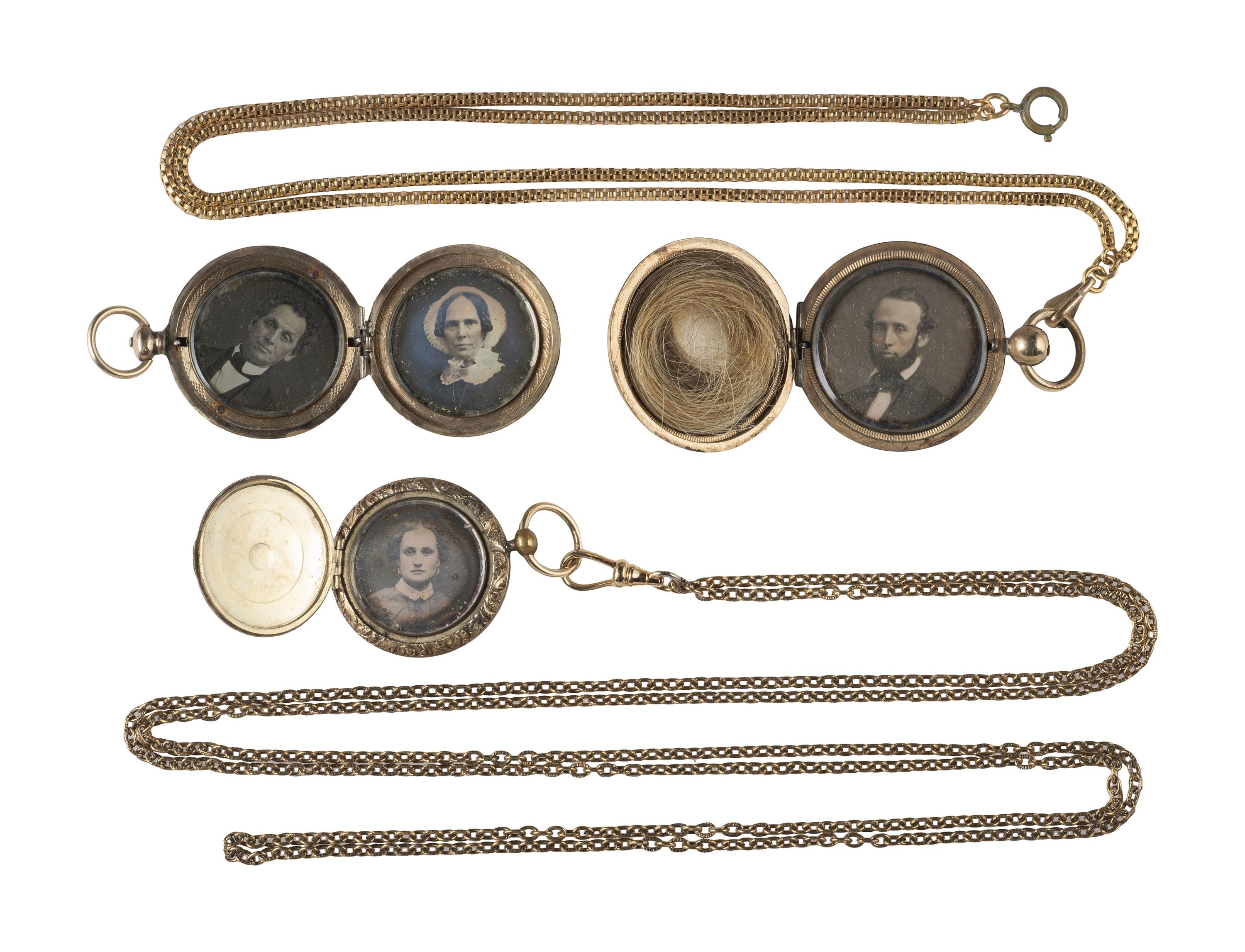 [EARLY PHOTOGRAPHY]. 11 lockets containing daguerreotypes and tintypes.