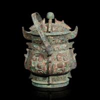 A Chinese archaistic bronze covered ritual wine vessel, You 青銅提梁卣
