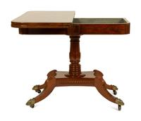 A Pair of Regency Flame Mahogany Flip-Top Games Tables — 19TH CENTURY