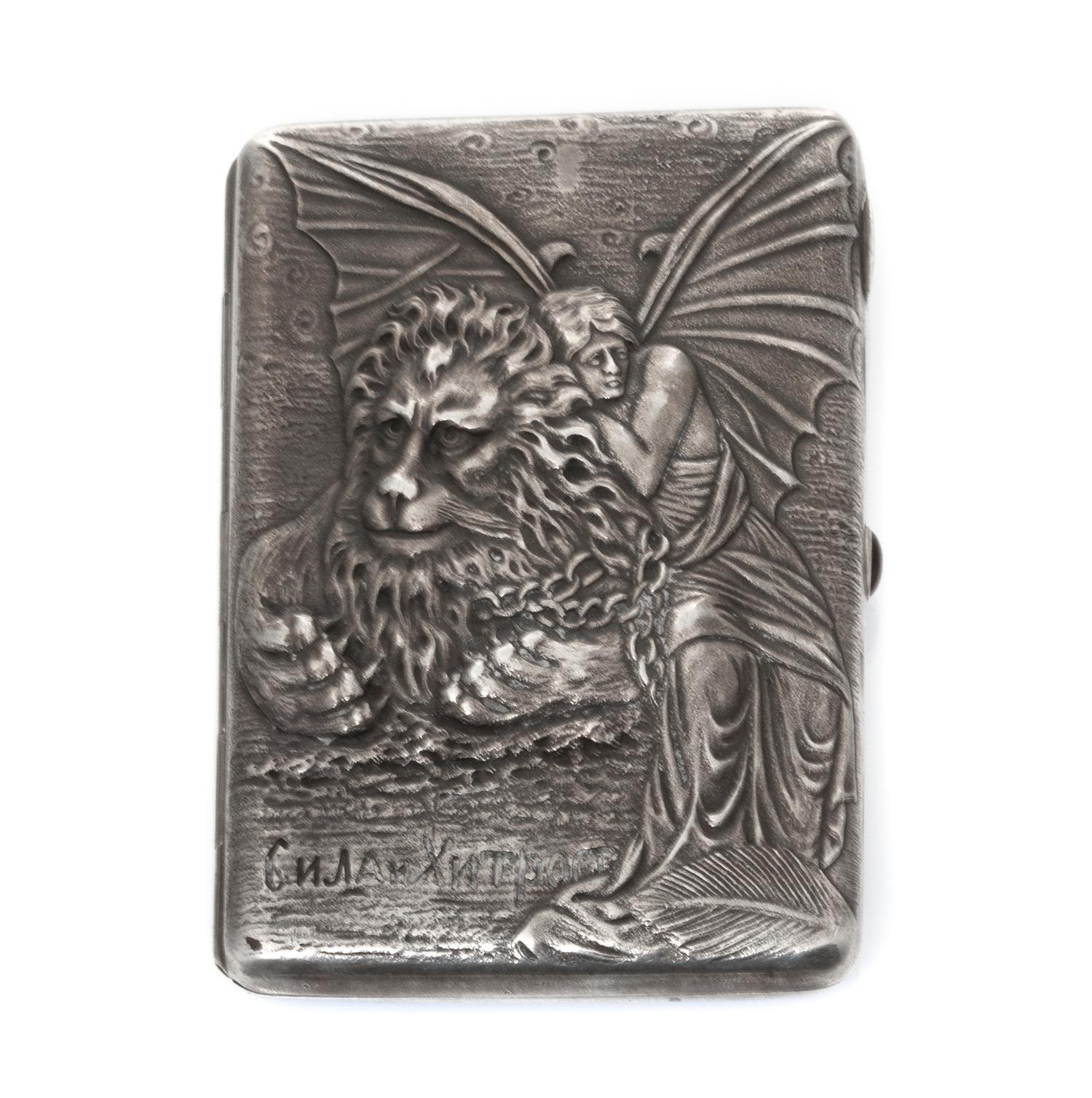 A Russian Silver Cigarette Case, Maker's mark Cyrillic BYu, Moscow, the lid worked to show a woman clinging to the back of a winged lio