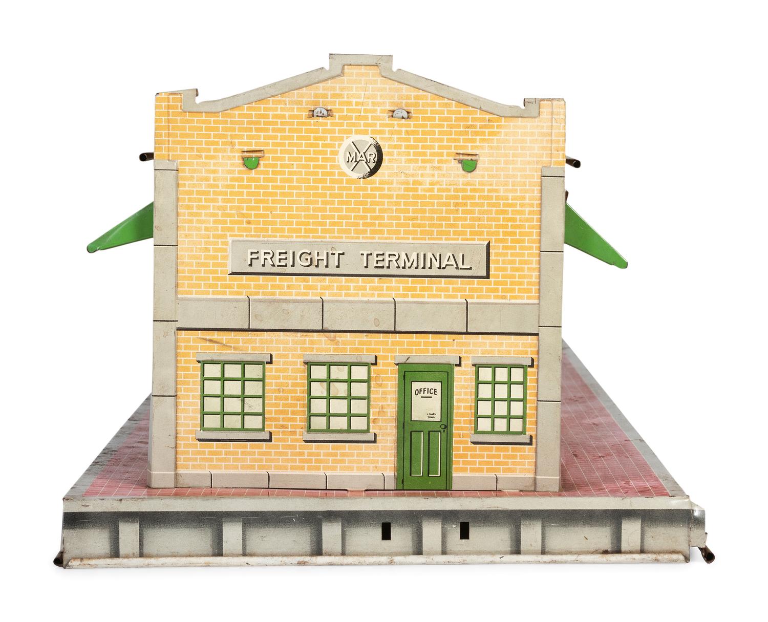 A Group of Toy Service Stations and Cars