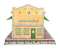 A Group of Toy Service Stations and Cars