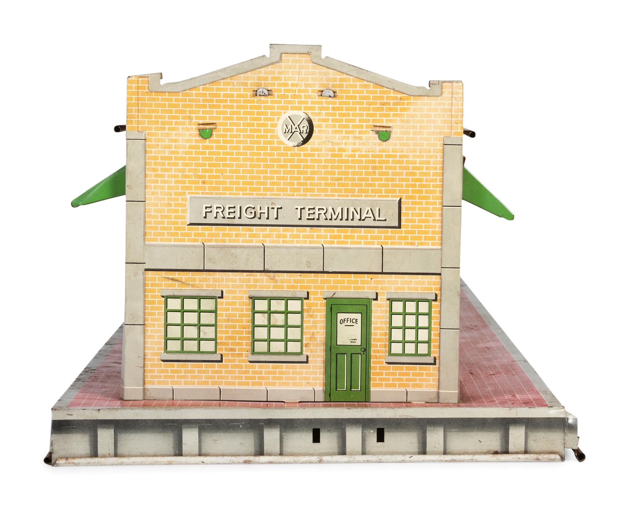 A Group of Toy Service Stations and Cars