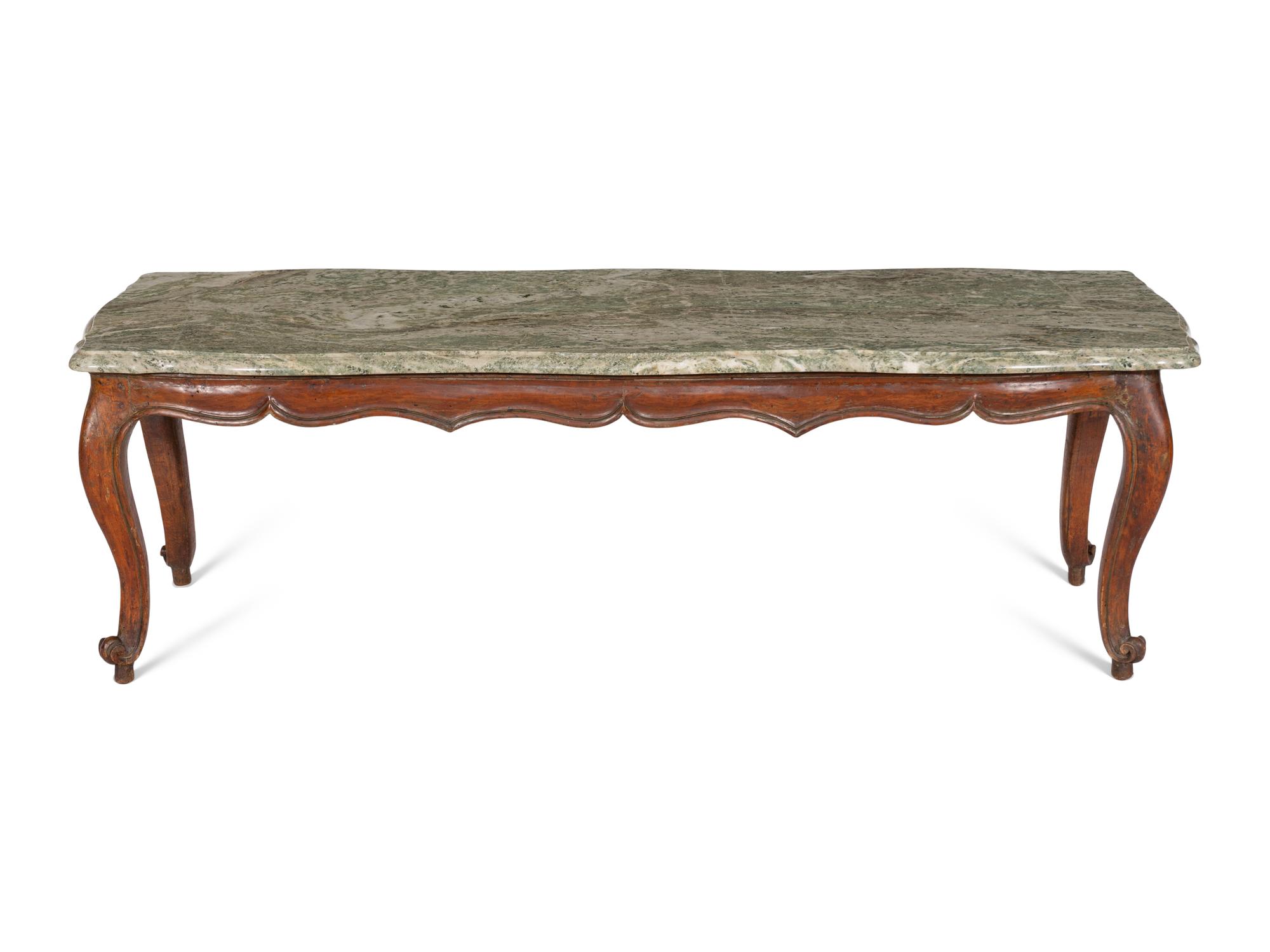 A Louis XV Provincial Carved Walnut Low Table with Serpentine Verde Marble Top