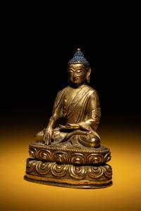 A Small Sino-Tibetan Gilt Bronze Figure of Seated Buddha Shakyamuni