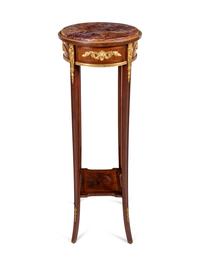 A Louis XVI Style Gilt Bronze Mounted Mahogany Marble-Top Pedestal Table