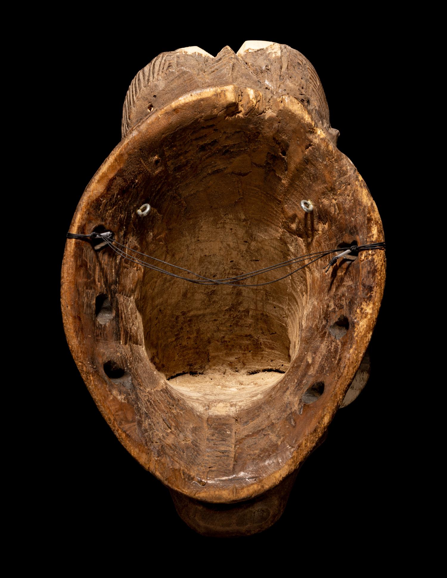 Four Punu Wood Masks