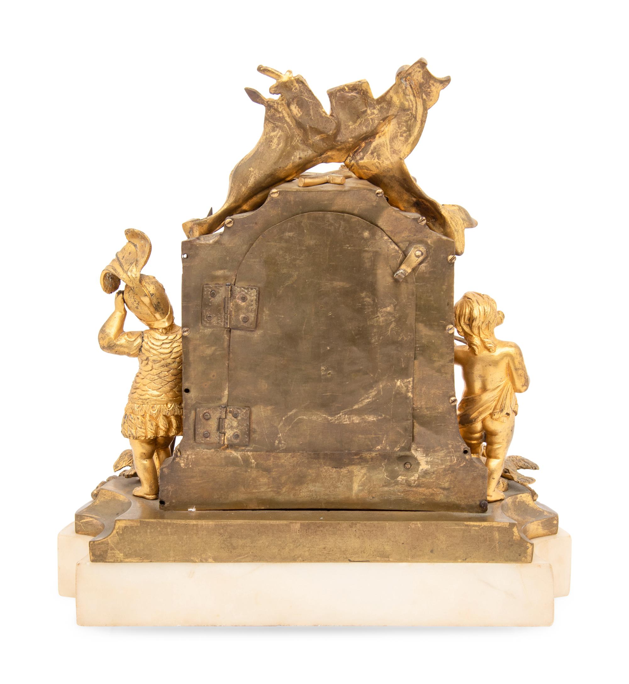 RELEASED TO OWNER - A French Gilt Bronze and Marble Mantel Clock