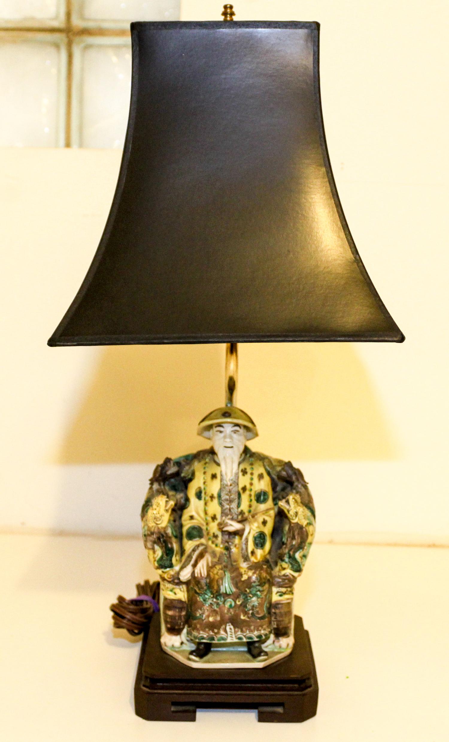 A Chinese Famille Verte Biscuit Figure of an Official. Height overall 20 1/2 inches.